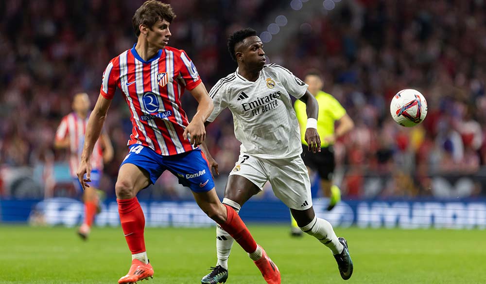 Marcos LLorente y Vinicius Junior