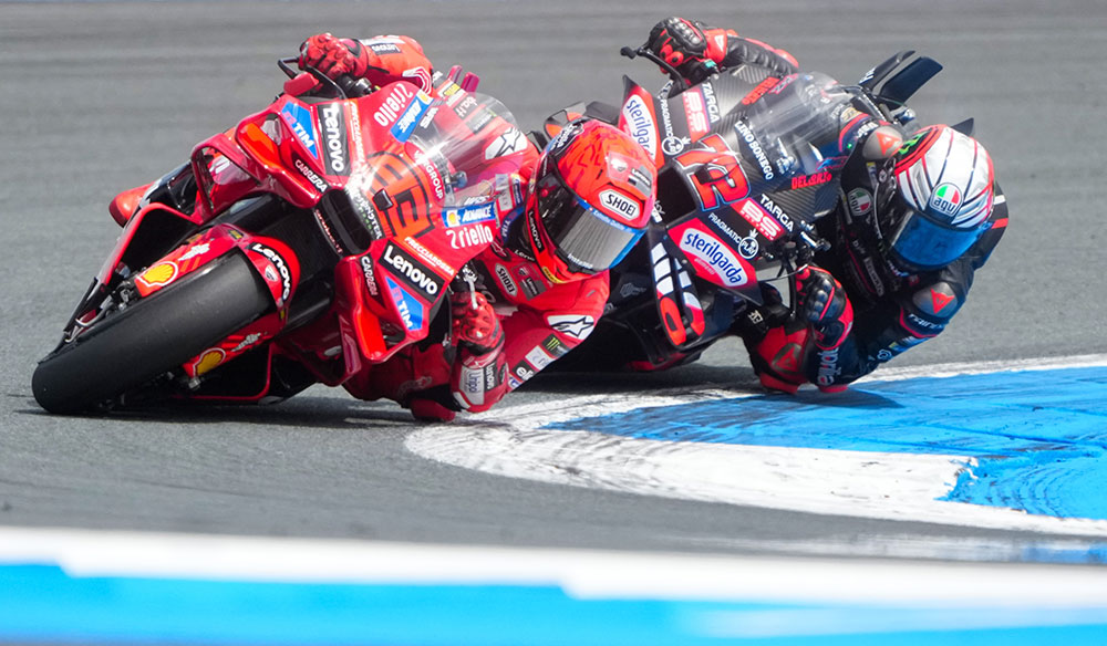 Marc Márquez y Marco Bezzechi