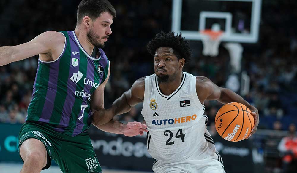 Jonathan Barreiro del Unicaja y Andrés Feliz del Real Madrid